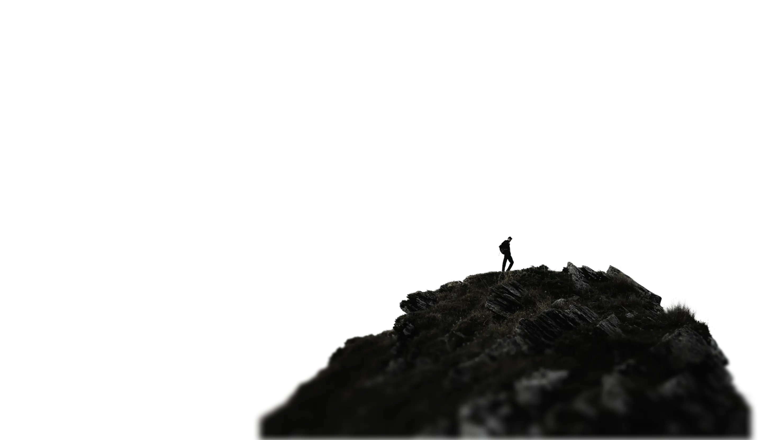 man on top of a mountain