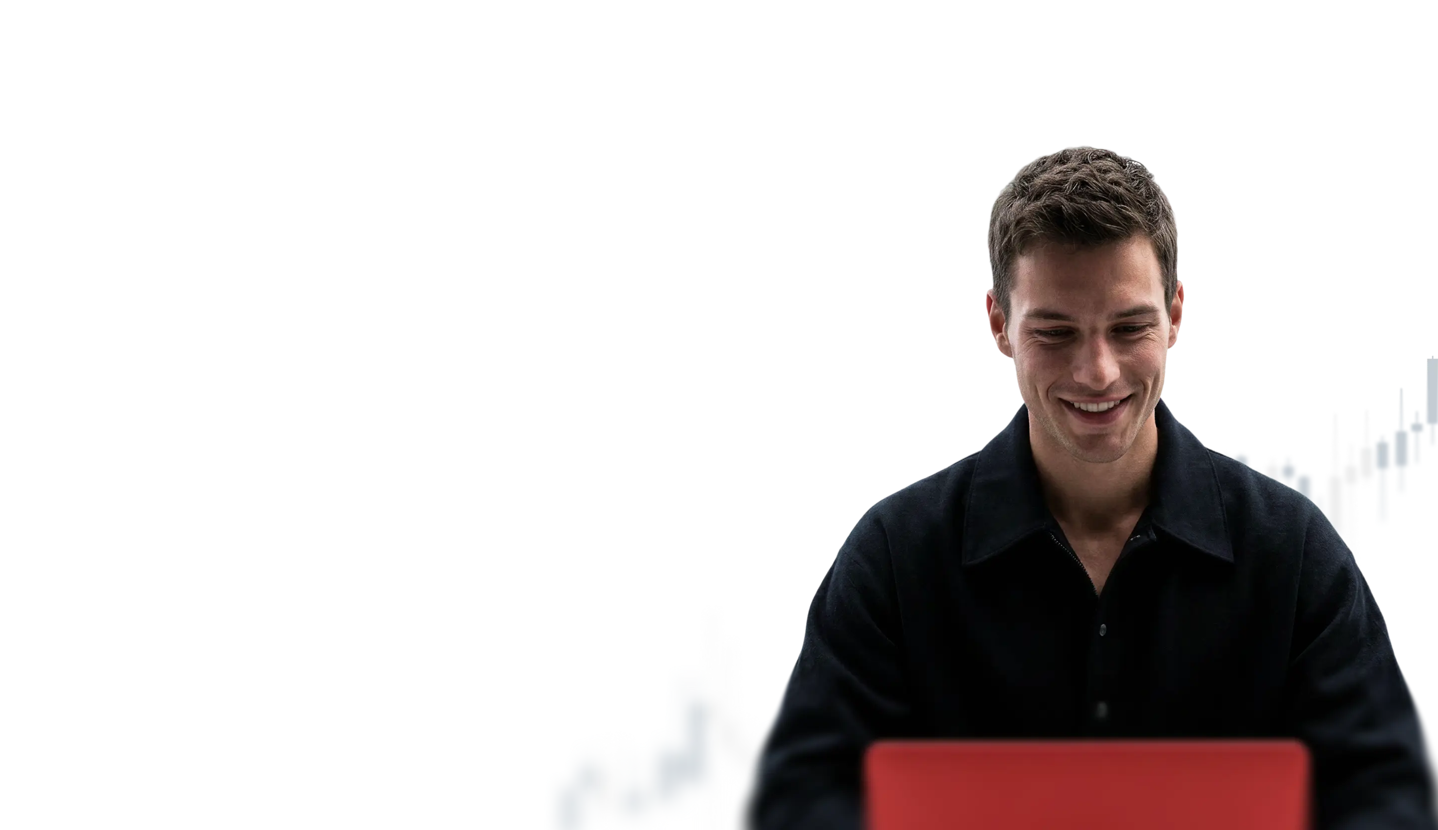 man using trading app on laptop