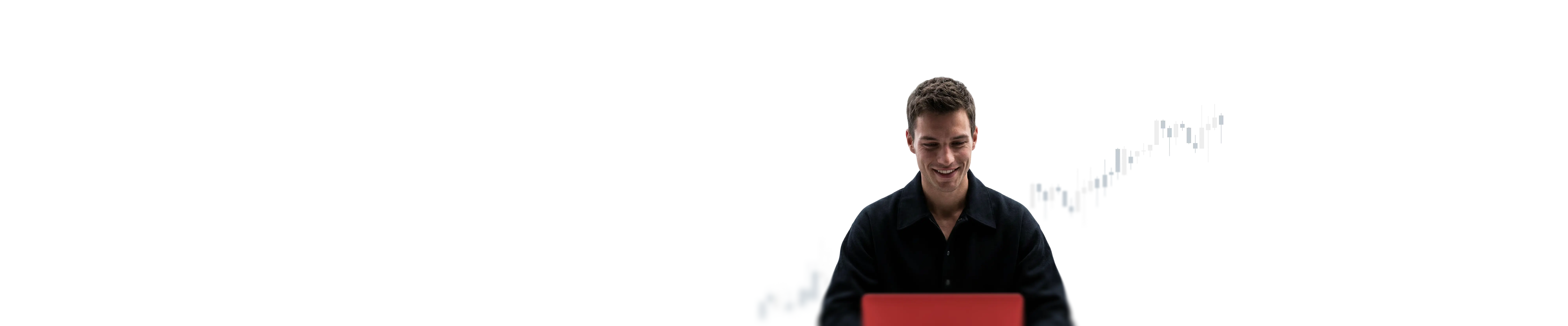 man using trading app on laptop